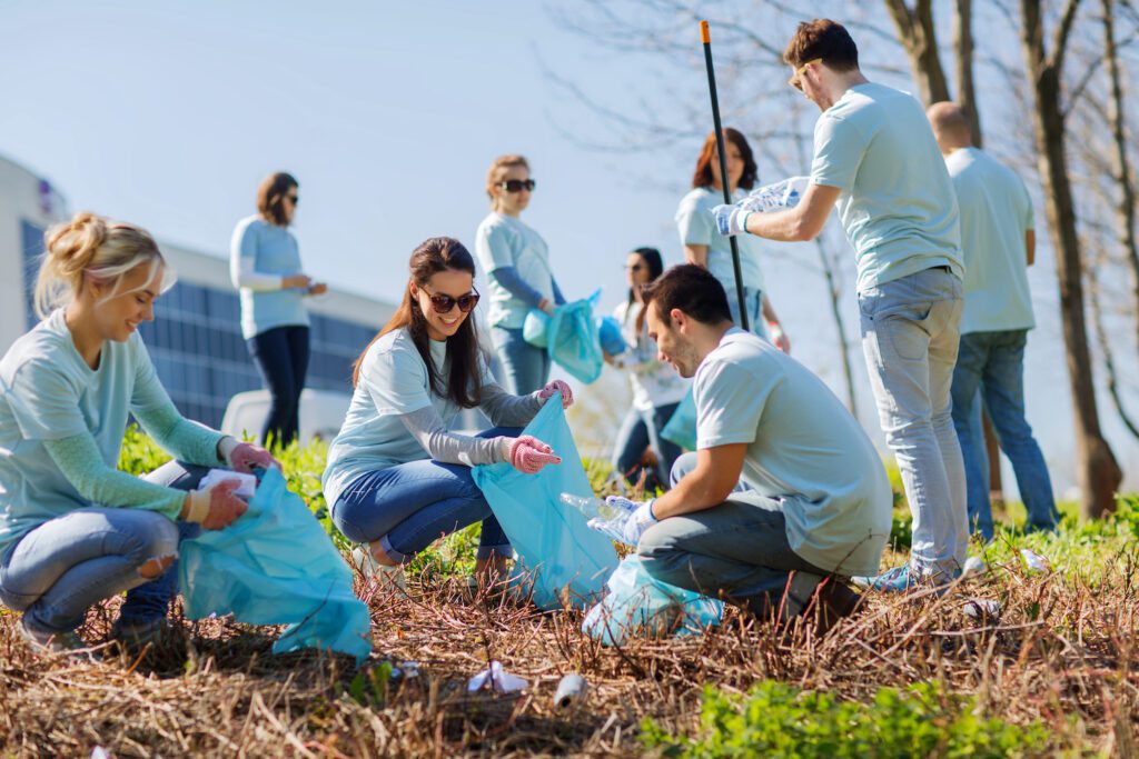 volunteers cleaning and recycling