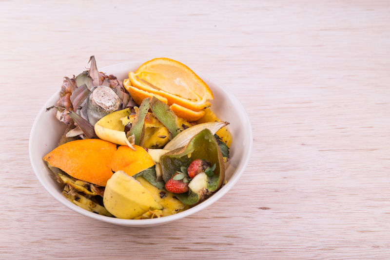 Bowl of household vegetable and fruits refuse collected for compost